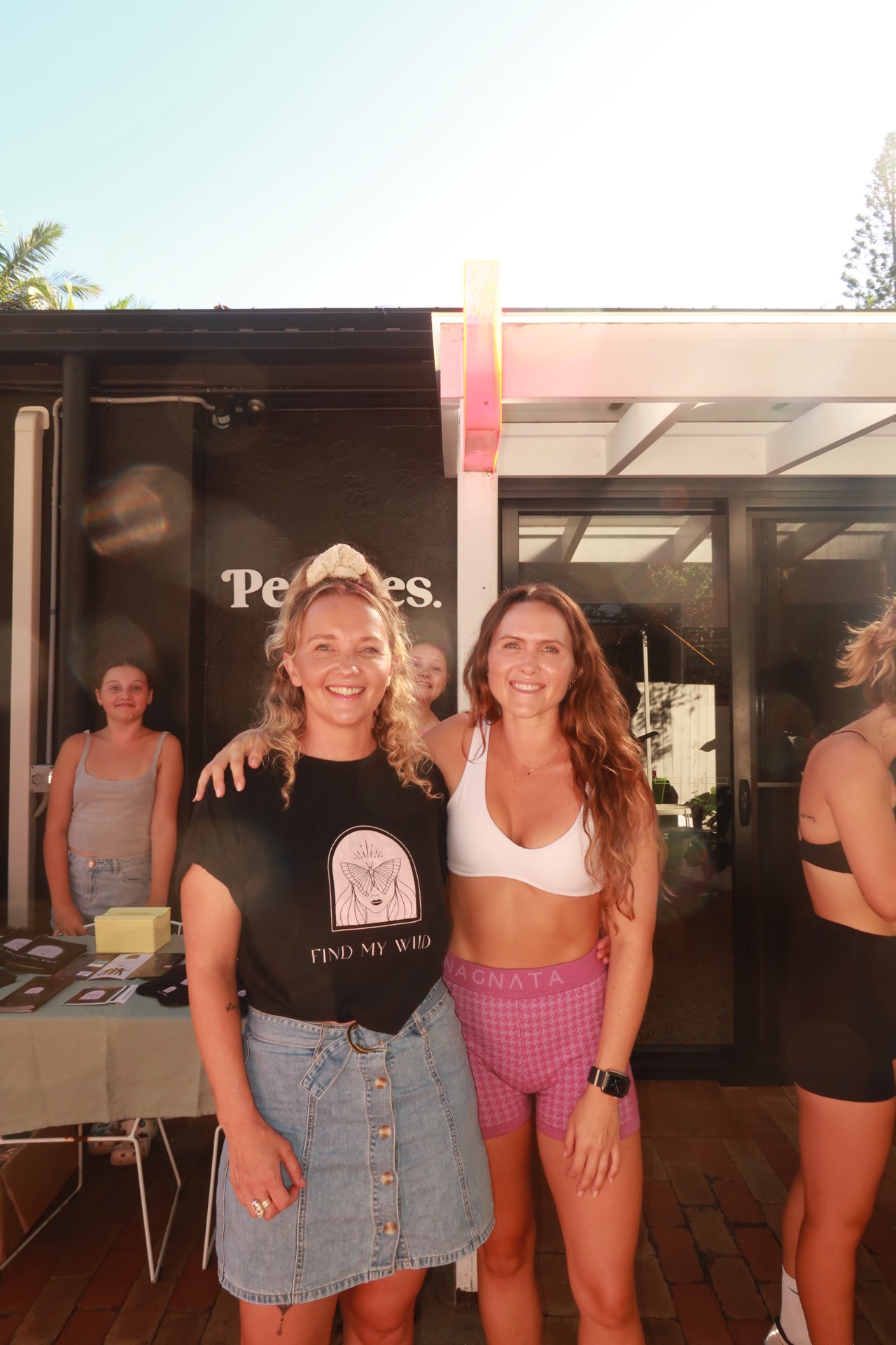 Lauren with a friend at a Find My Wild pop-up