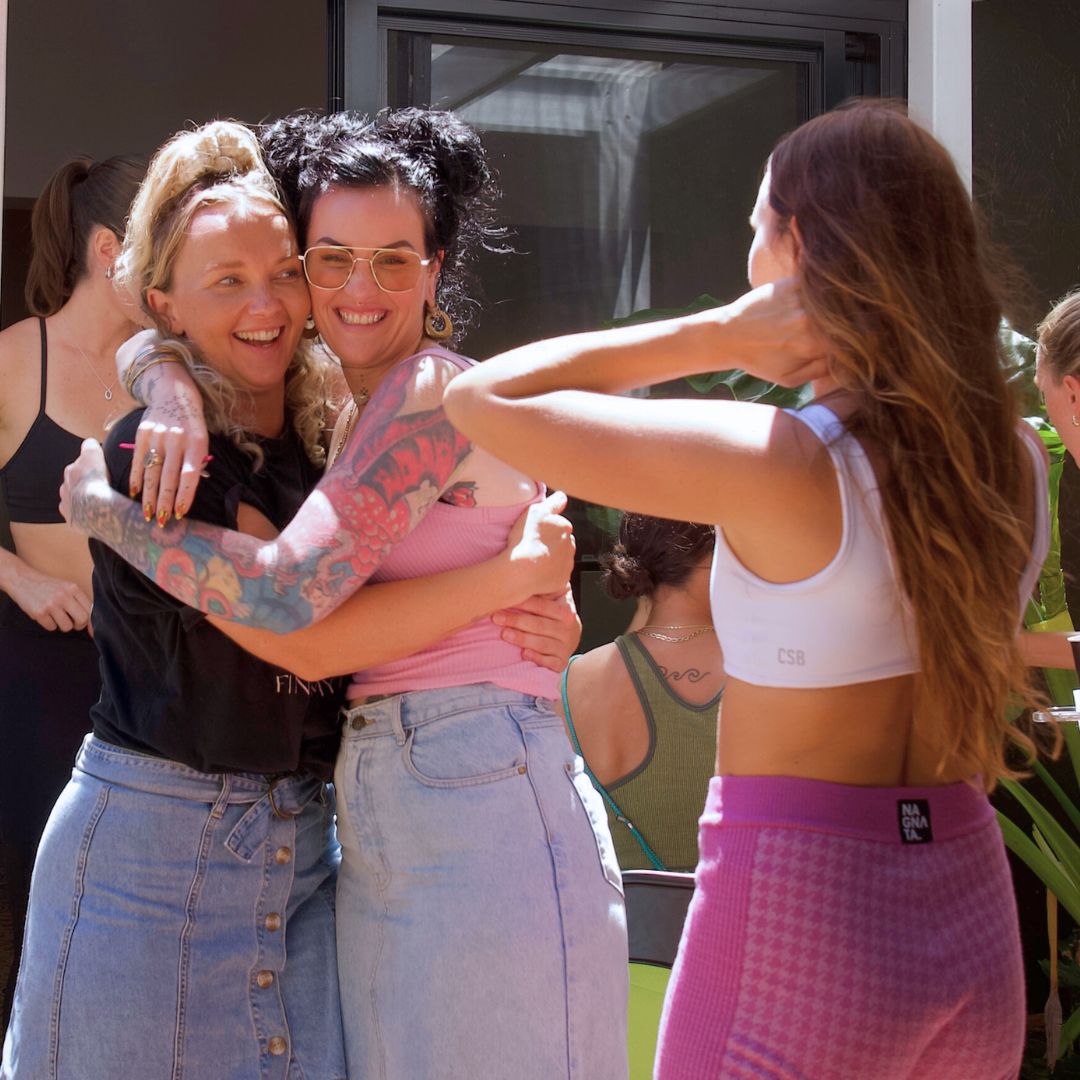 Lauren hugging a supporter at a community event